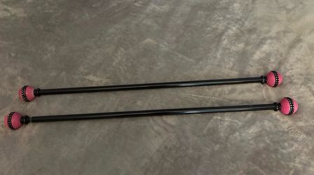 2 pc black n pink curtain rods