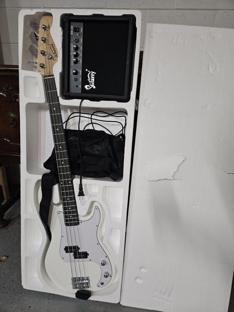 Brand New Electric 4 String Guitar W/amplifier