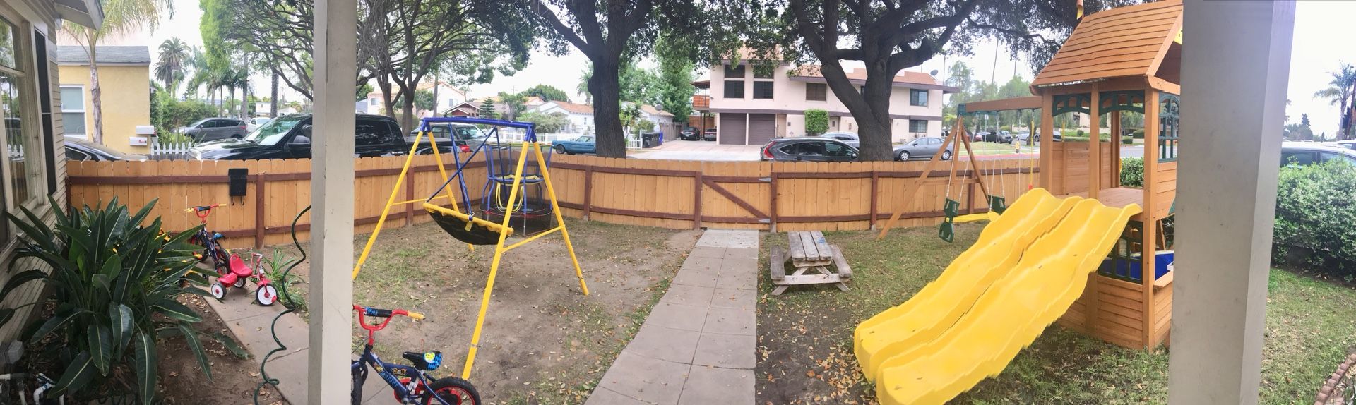 New cedar fence with new amazing swing set