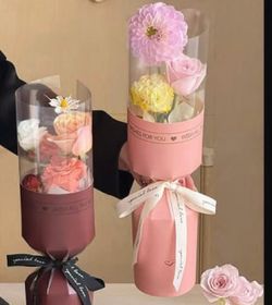 Yellow cylinder sleeves for flowers