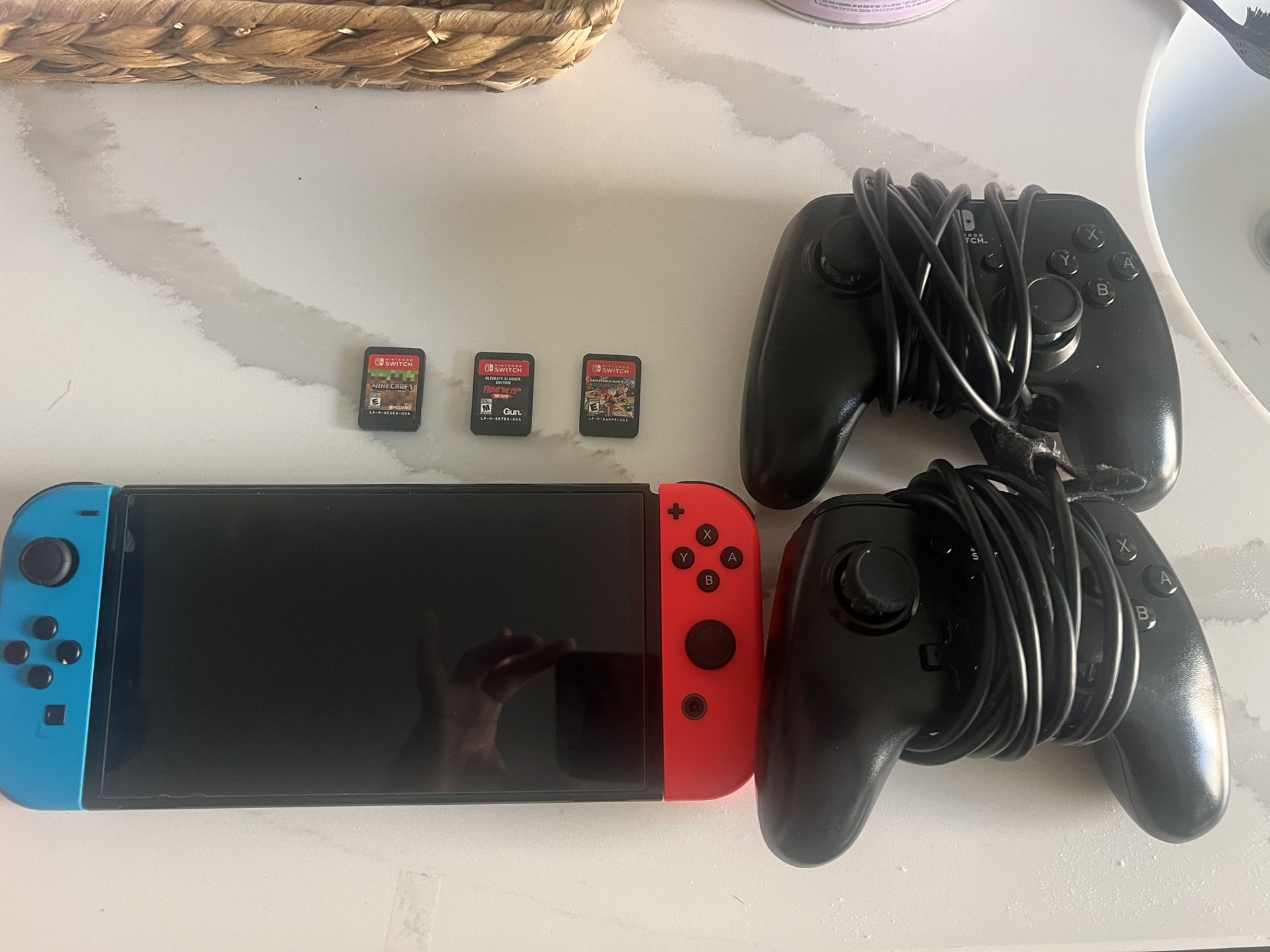 Nintendo Switch With Games And Remotes And Charging Station for Sale in