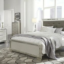 Lonnix Silver LED Upholstered Panel Bedroom Set

