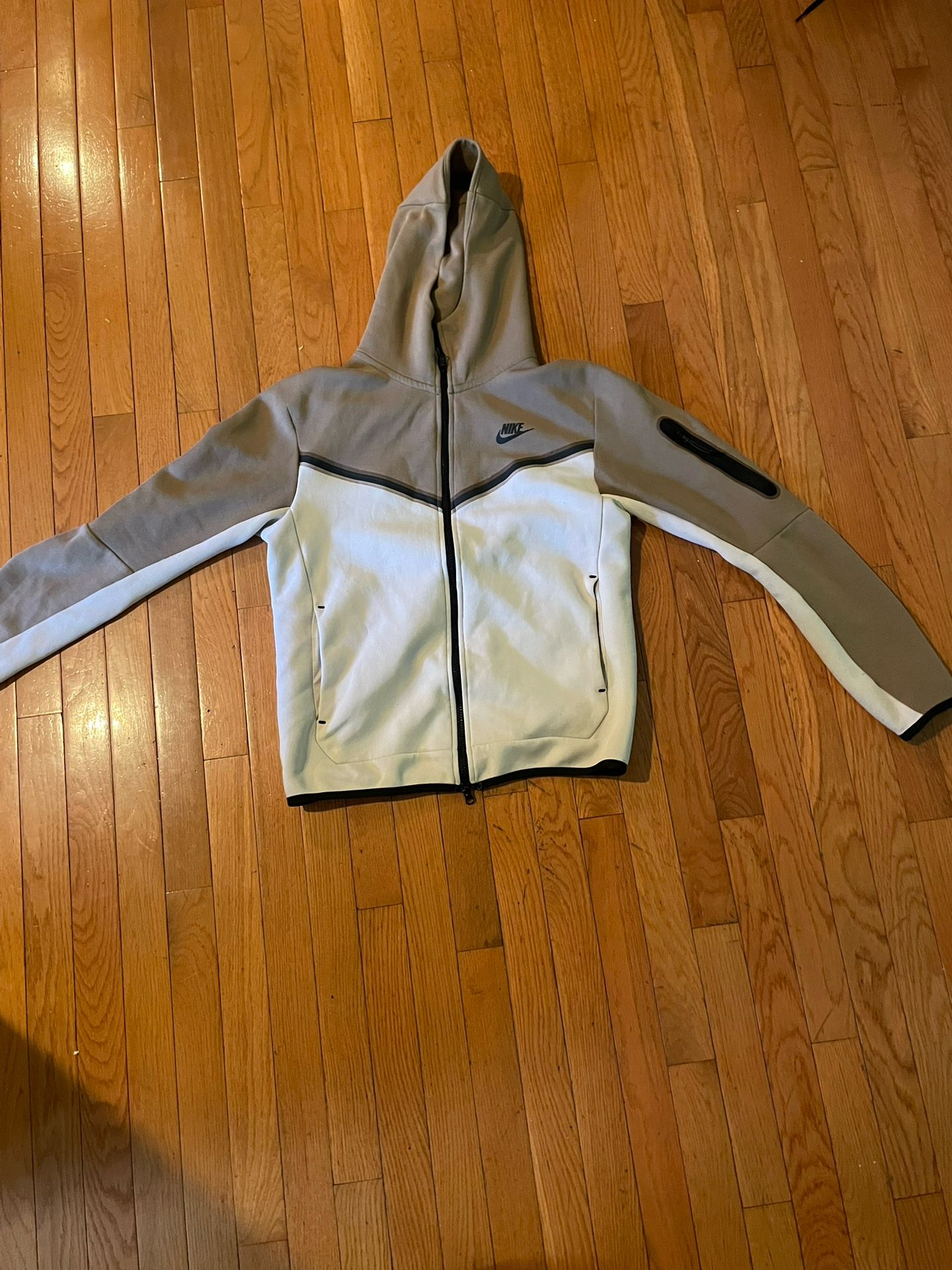 White and brown Nike Tech Fleece