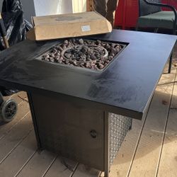 Propane, outdoor fireplace with ceramic balls