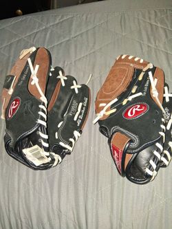 2- left hand Rawlings baseball glove