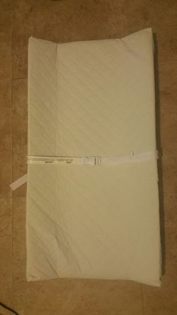 Baby changing pad with soft cover