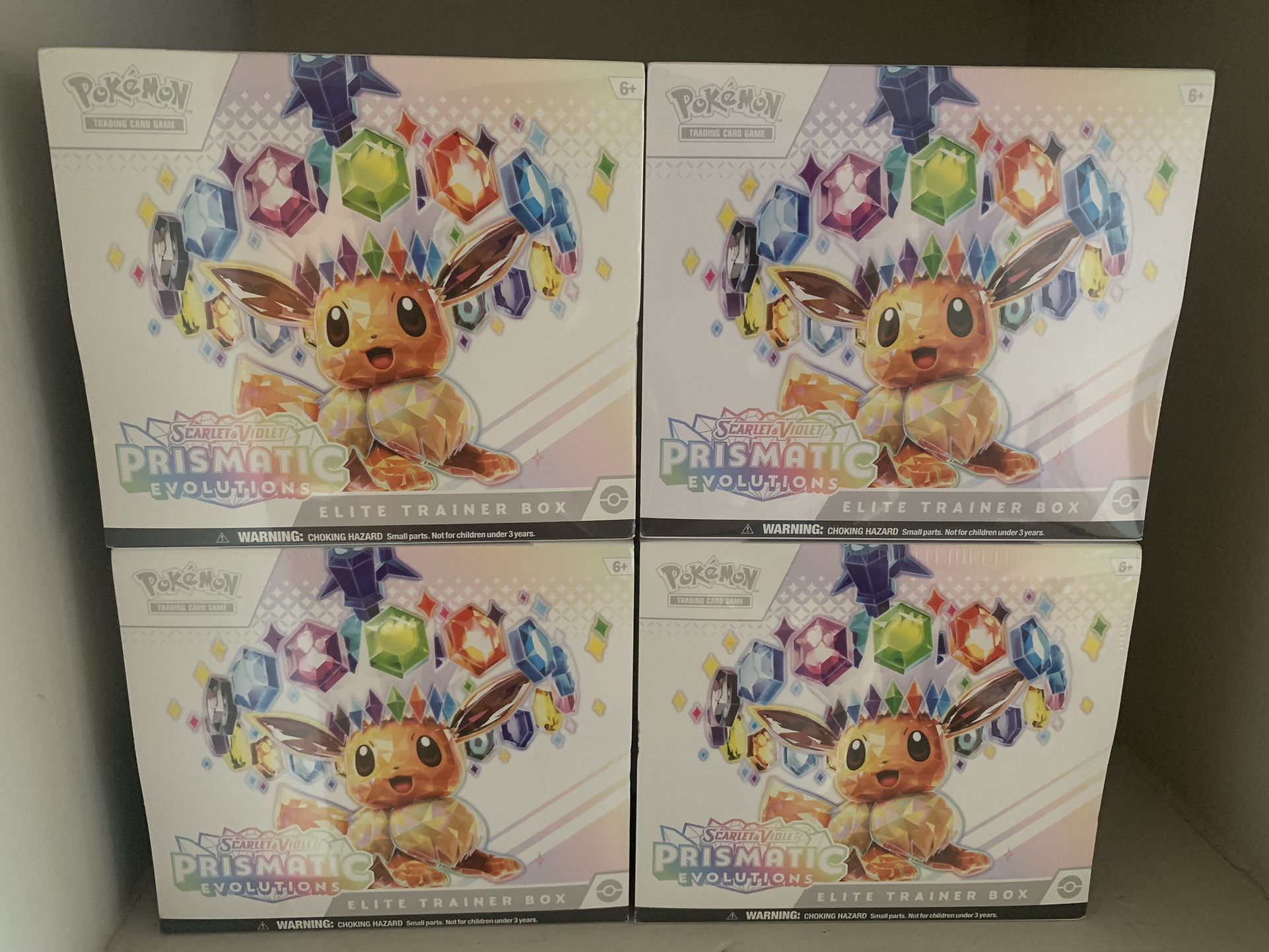 Pokemon Prismatic Evolutions ETBs