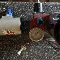 High-performance electric fuel pump with filter and fuel filter gauge