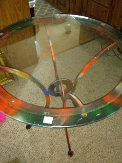 Glass top round metal table