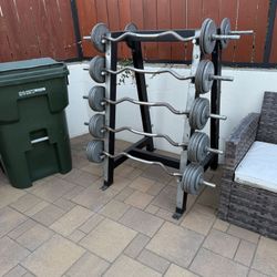 Set Of Curling Bar Weights & Rack With Adjustable Bench