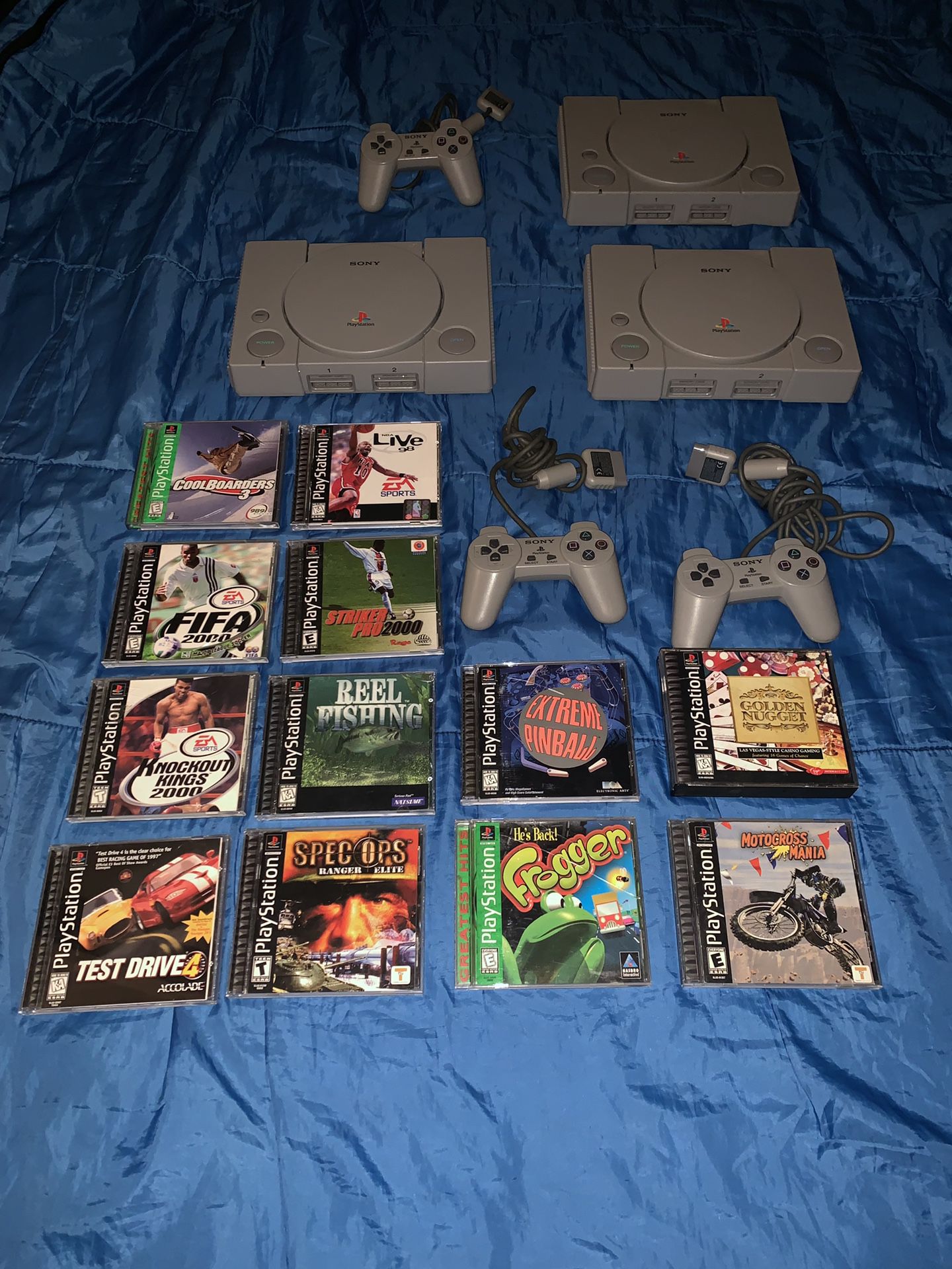 3 PS1 Consoles (they all work and come with cords for each) and 12 games - Everything for $50
