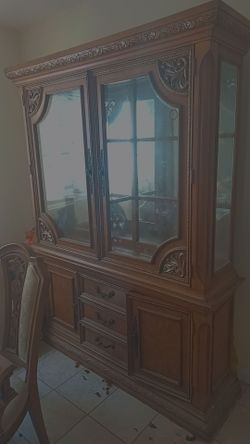 China cabinet with table and chairs (the plates and cups are not included)