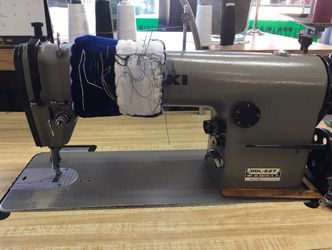 Sewing machine with table