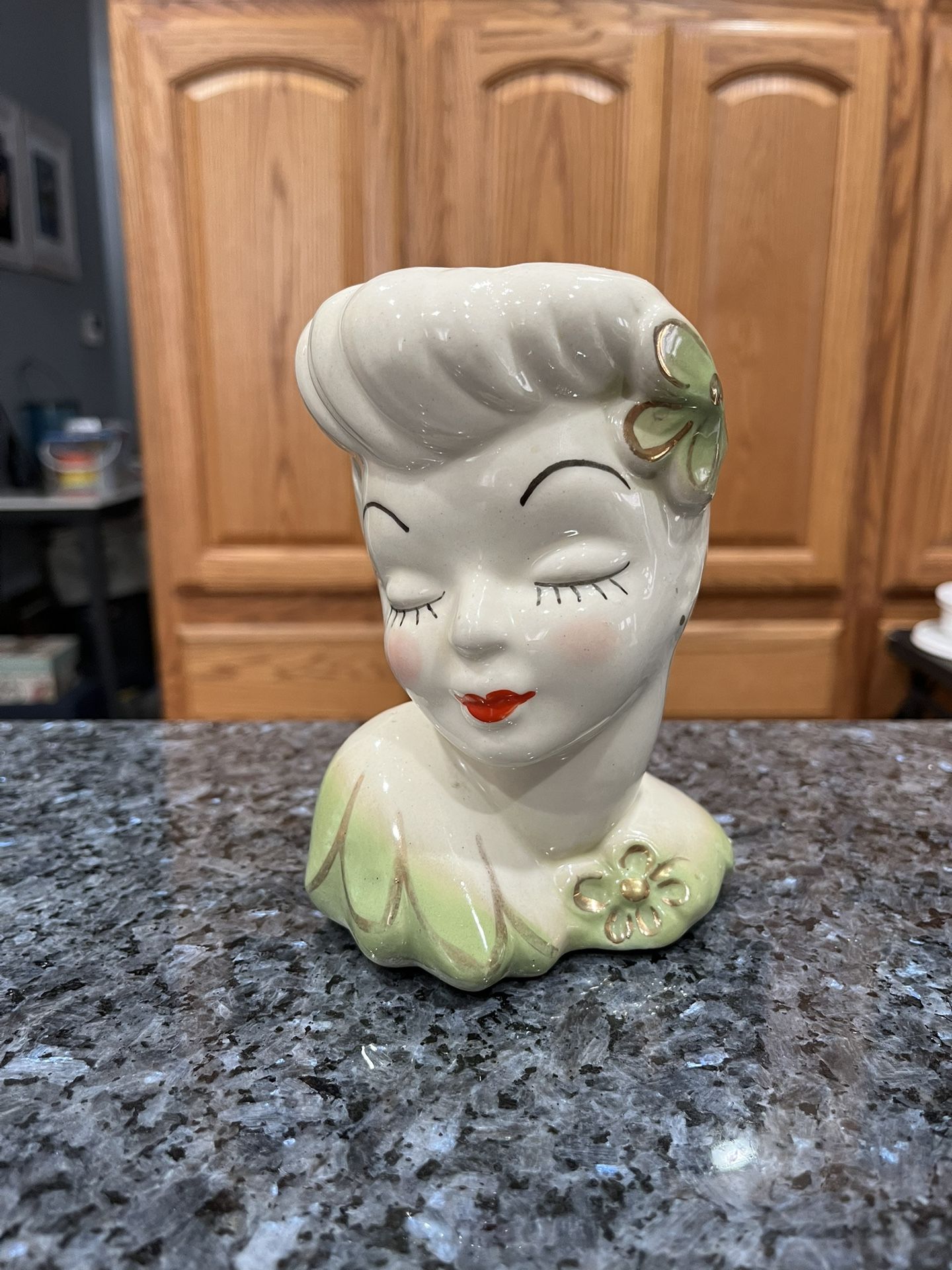 Vintage 1950’s Ceramic Glamour Girl Lady Head Vase. Size approximately 6 inches tall. Preowned no cracks or chips. Smoke free home
