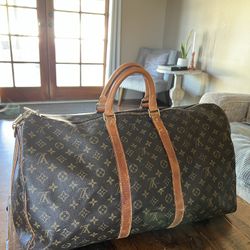 Vuitton luggage bag