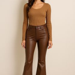 Turn heads in our Cocoa Leather Brown Flare Pants! 