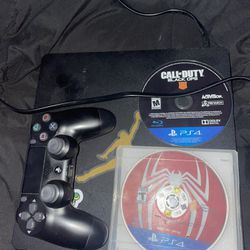 PS4 Slim With 2 Games.     WILL CLEAN BEFORE PICKUP