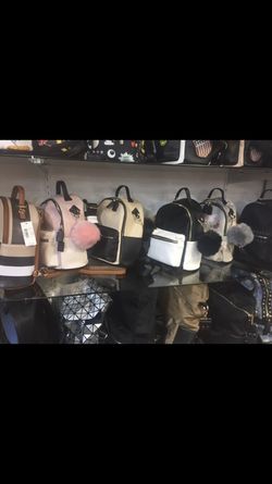 Females cute purses/backpack