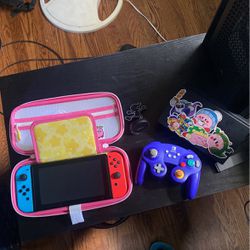 Nintendo switch with controller and amiibo