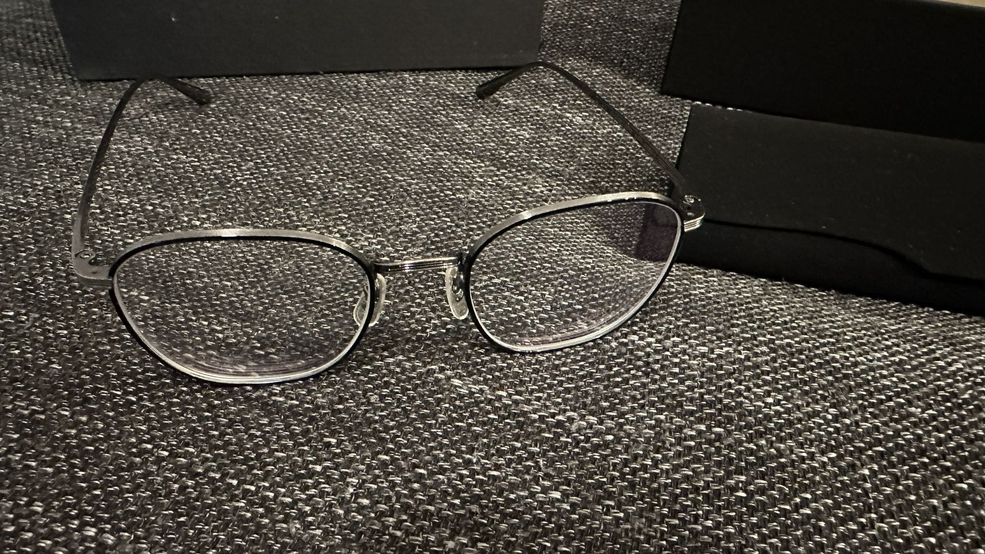 Oliver People’s Glasses with Sunglasses Clip The Row Board Meeting Clothing