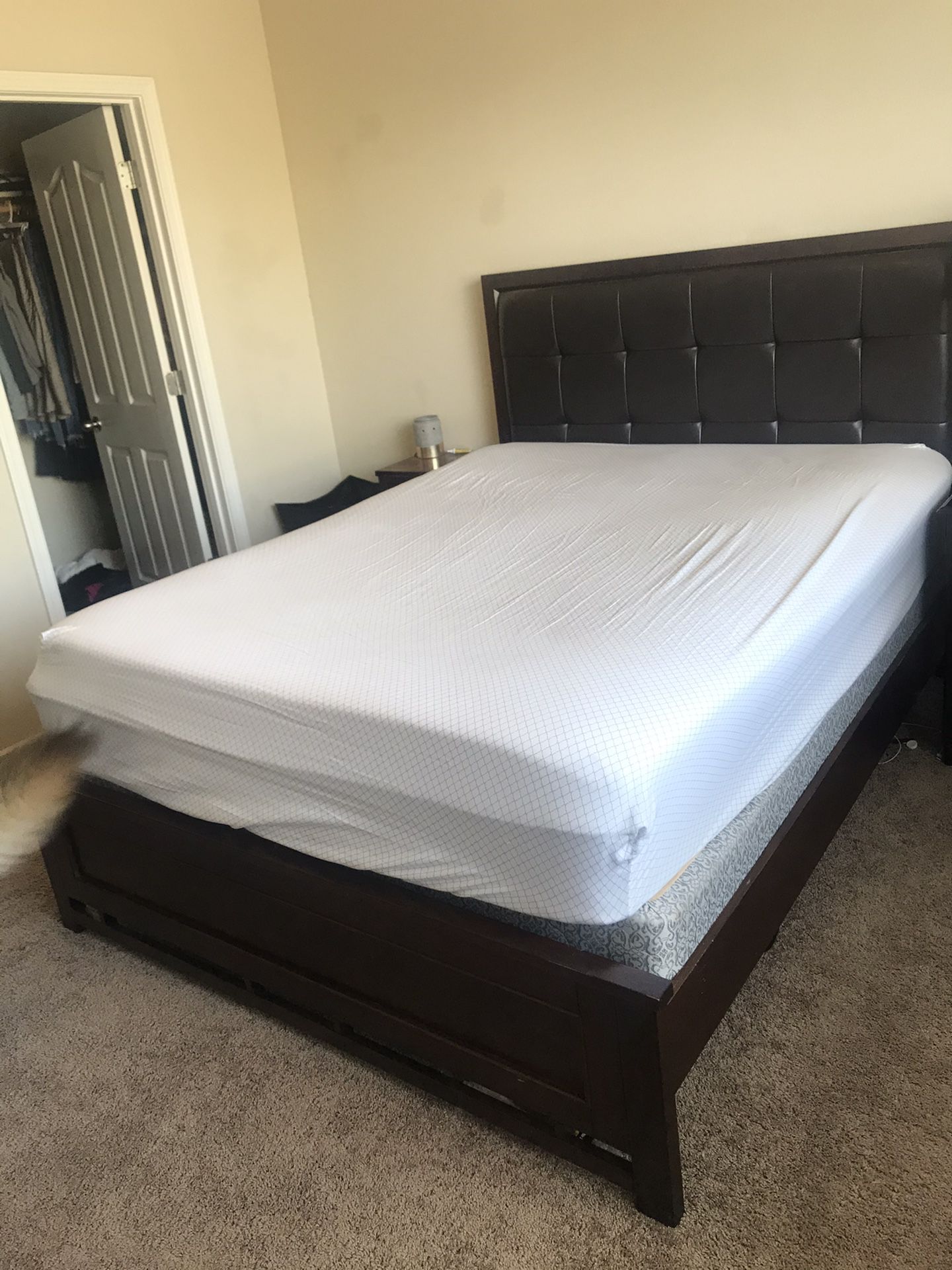 Queen size bed frame, box spring & mattress for sale. Nightstand also available