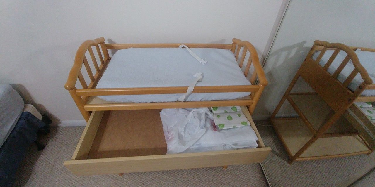 Diaper changing table, pad, and extra covers