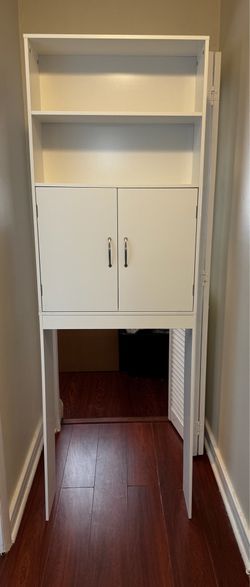 White over the toilet storage cabinet