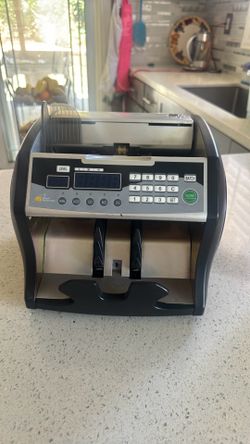 Bill counter and counterfeit detector