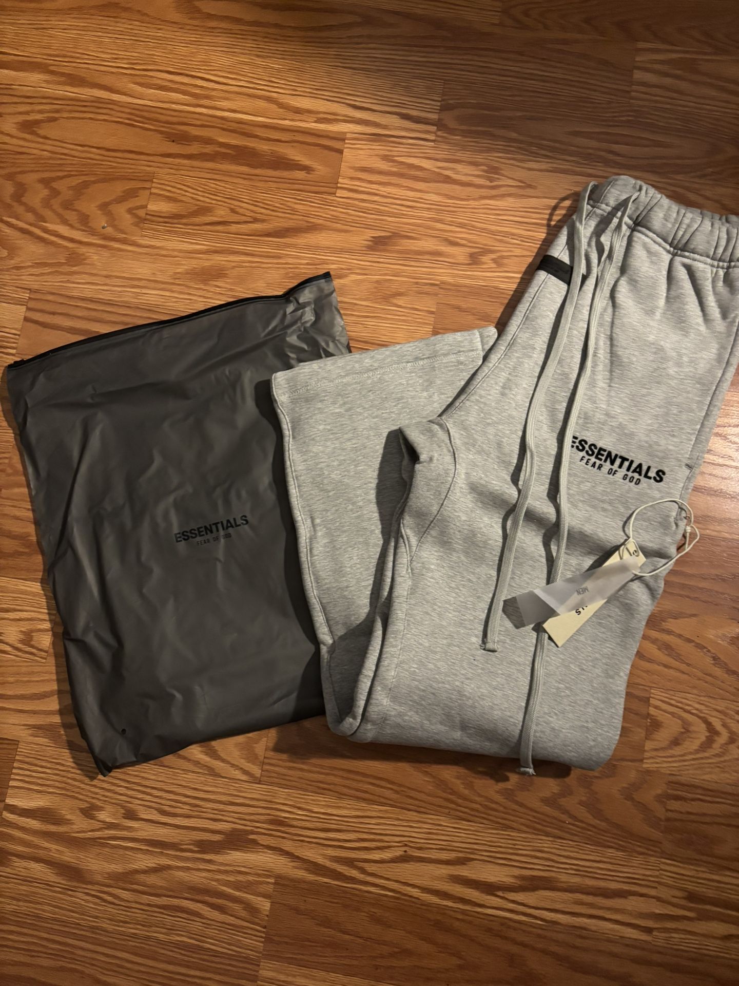 Brand new dark oat essential sweats size M