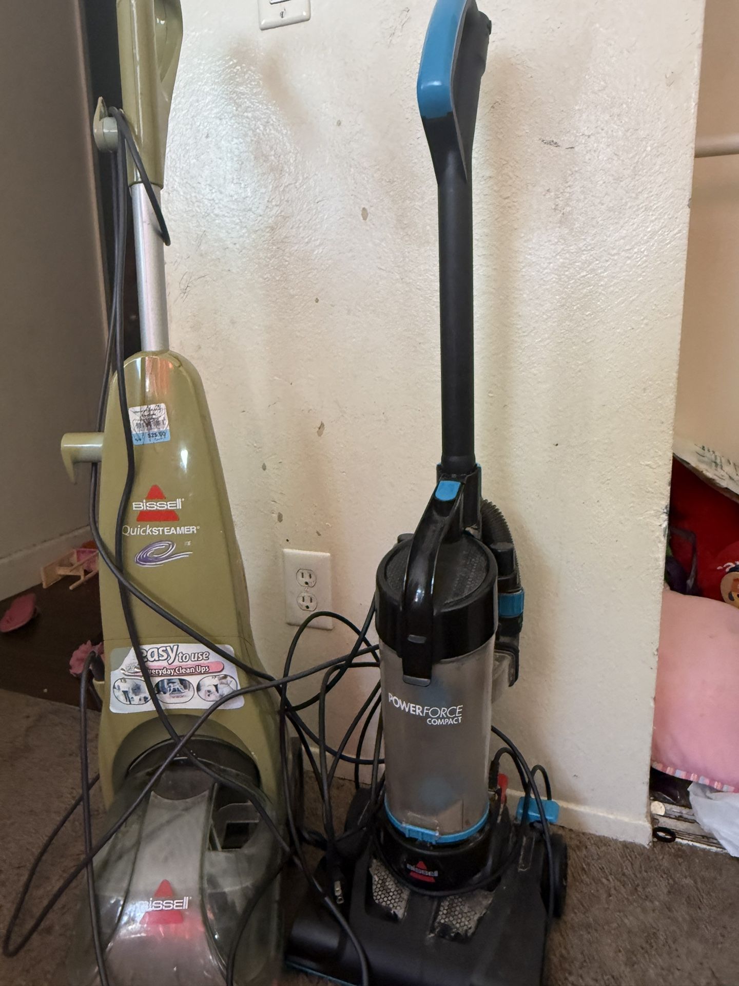 two used vacuum cleaners