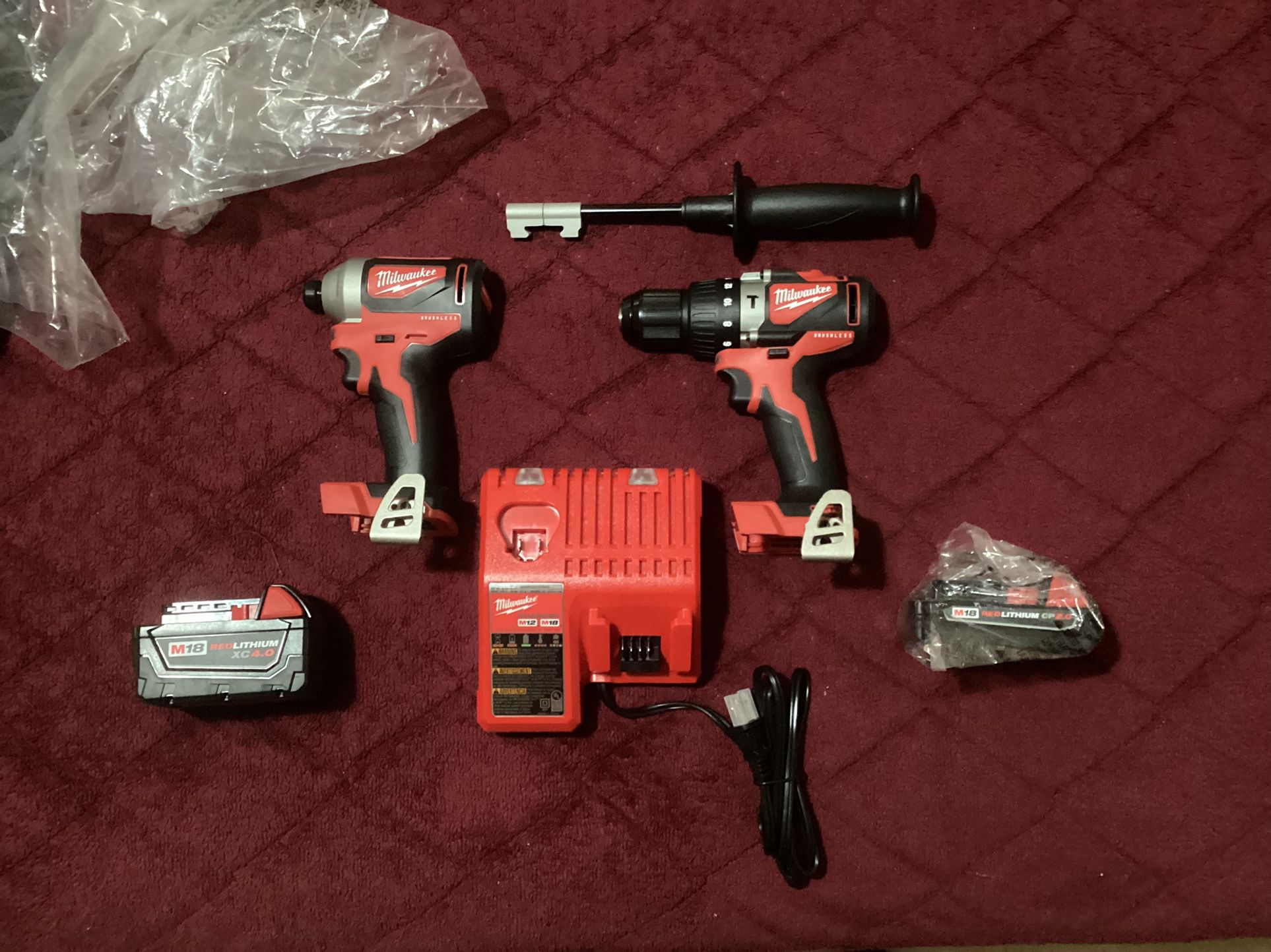 MILWAUKEE M18 Brushless Hammer Dril, Impact Driver, Charger And Two Batteries 