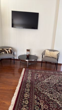 Coffee table and 2 armchairs