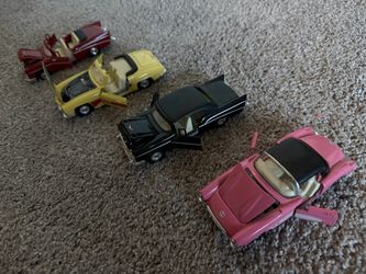 Four Convertible Styled Cars - Vintage. (pink, yellow, red, and black)