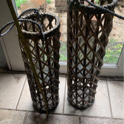 Two Glass And Wicker Hurricane Candle Holders