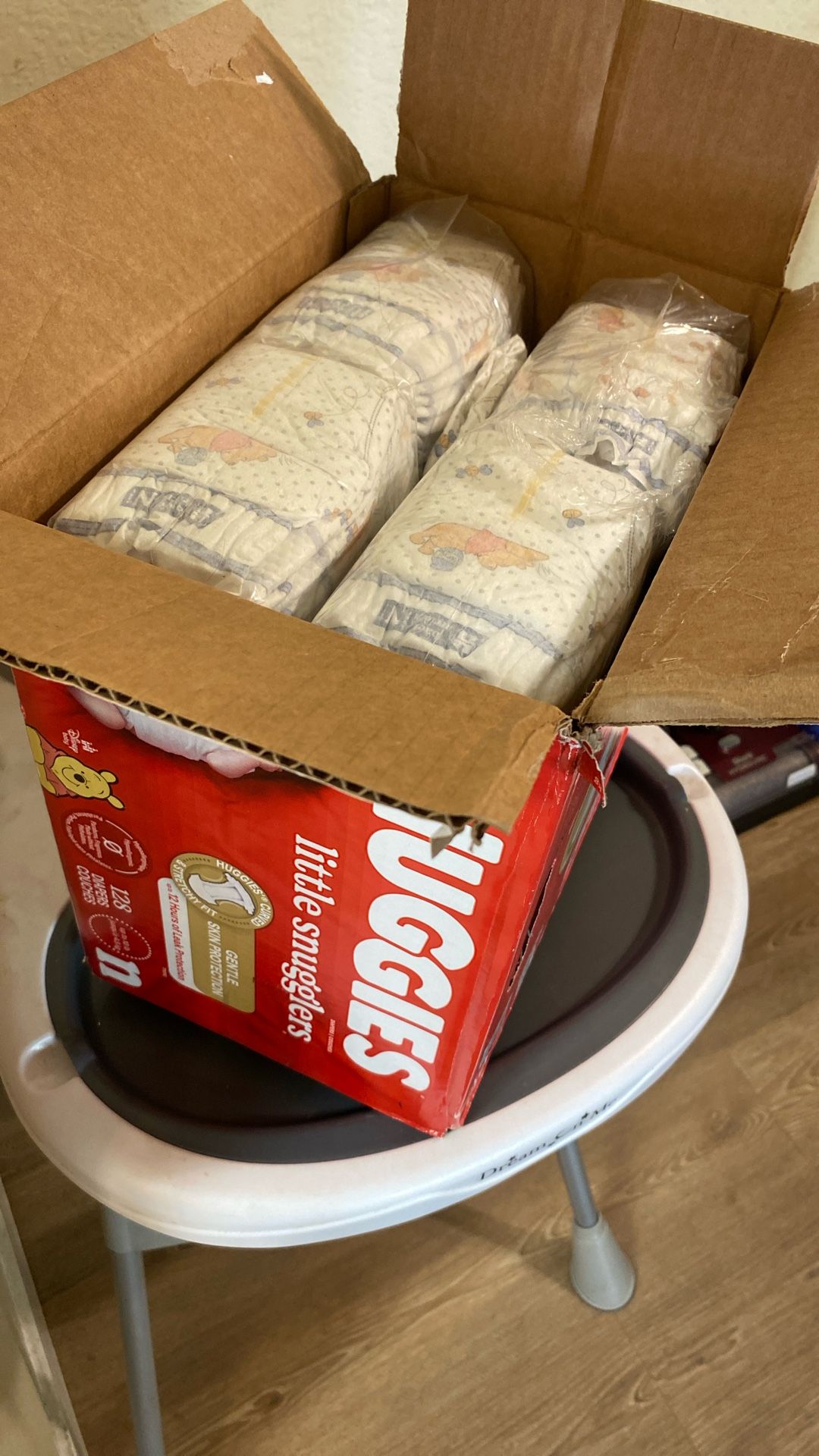 Newborn Diapers & High chair 