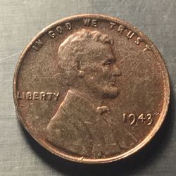1943 Bronce Lincoln wheat 1 cents it is not mannectic out photos of the tests with a weigh of 3.7 grams and tests with a himan