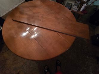 Brown 60s table. Still in good condition with 4 chairs, but one broken. Asking for $50 or best offer.