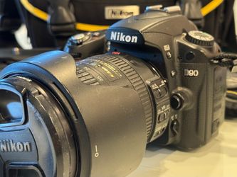 Nikon D90 w/ 18-200 plus Battery Pack & Grip Extension