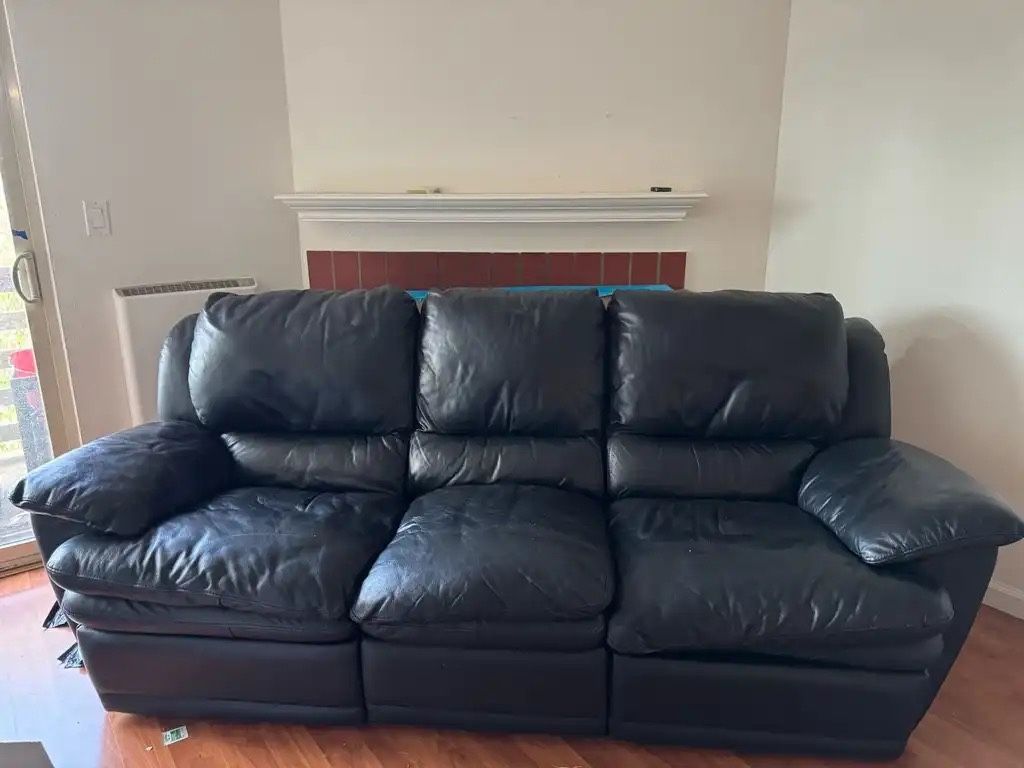 Black Leather Reclining Sofa