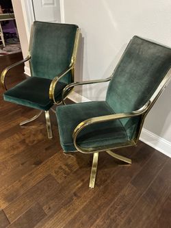 Vintage green chairs that swivel