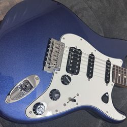 Fender Stratocaster player 2 with lots of accessories