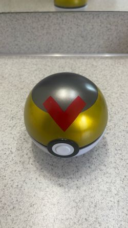 Two empty Pokémon Poké Ball tins