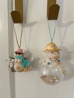 set of TWO Wilford & Lee beach-themed, snowman ornaments.