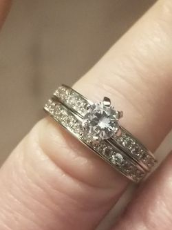 Solid 925 silver 2 piece wedding set with white cz's. Size 7.
