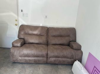 Leather reclining couch Ashley furniture