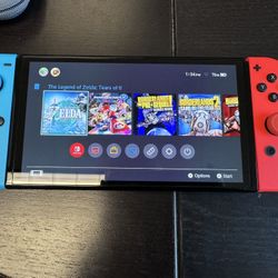Nintendo Switch OLED + Extras