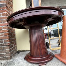 Round Pedestal Extending Dining Table