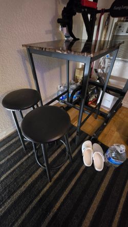 Tall bar table with two bar stools