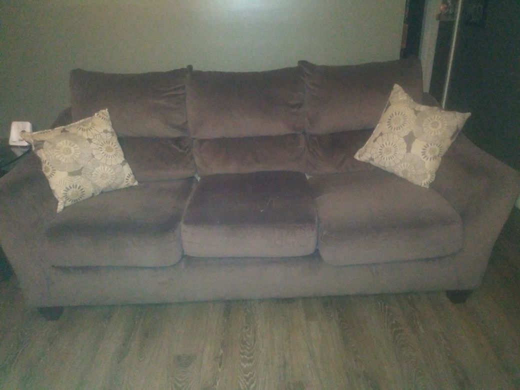 Ashley love seat couch in tables