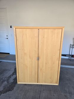 Large, solid wood cupboard